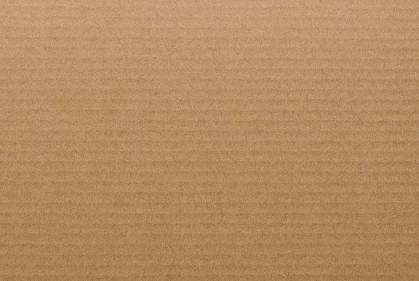 background and texture of brown paper corrugated sheet board surface
